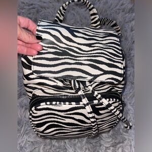 Bundle of small bookbag purses